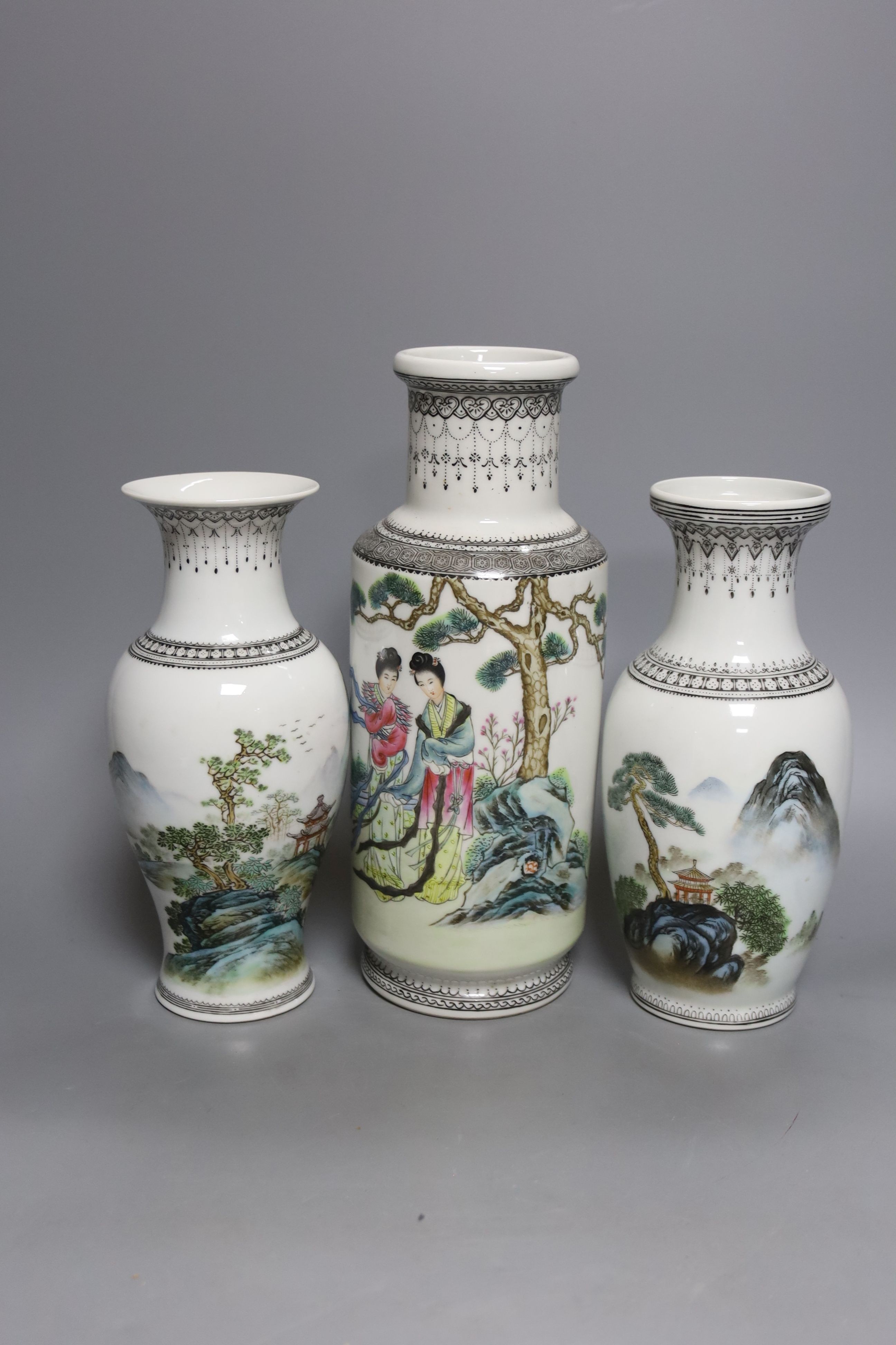 A group of seven Chinese famille rose vases, 20th century